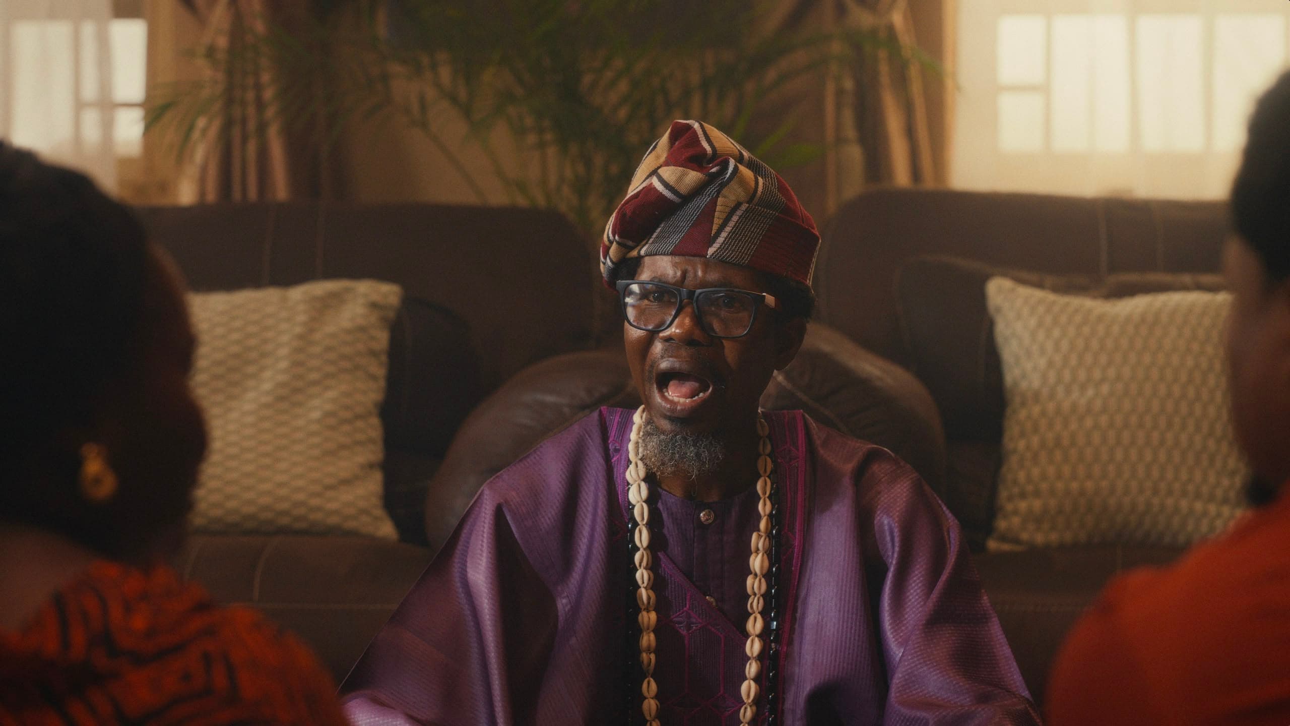 Still from Agbáraǹlá: The Return — The babaláwo speaks